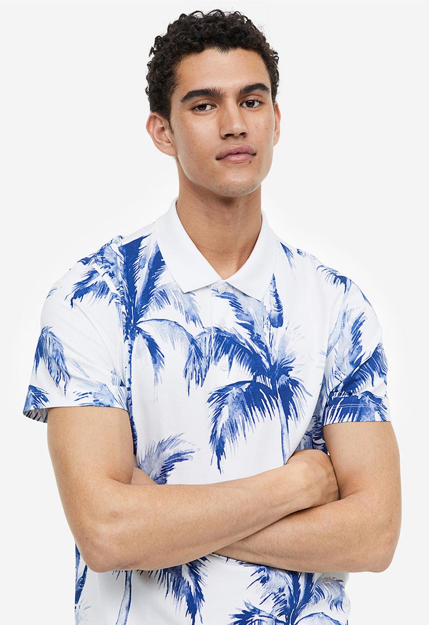 H&M - Regular fit printed polo shirt - white palm trees