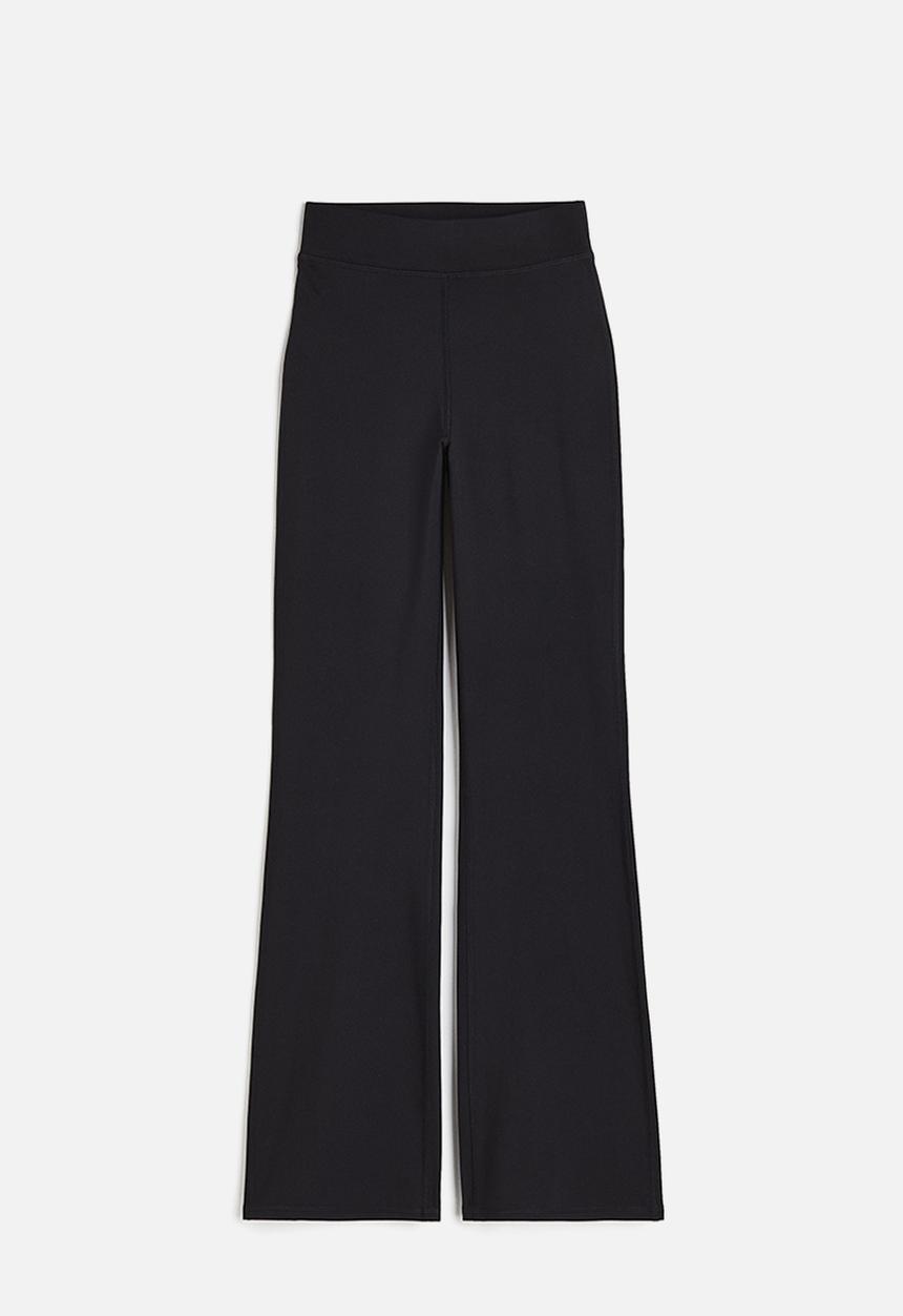 H&M - DryMove™ flared sports trousers - black