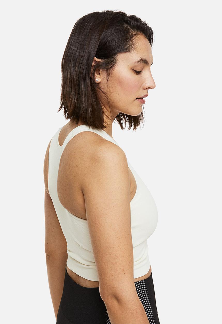 H&M - Drymove™ medium support sports bra - cream