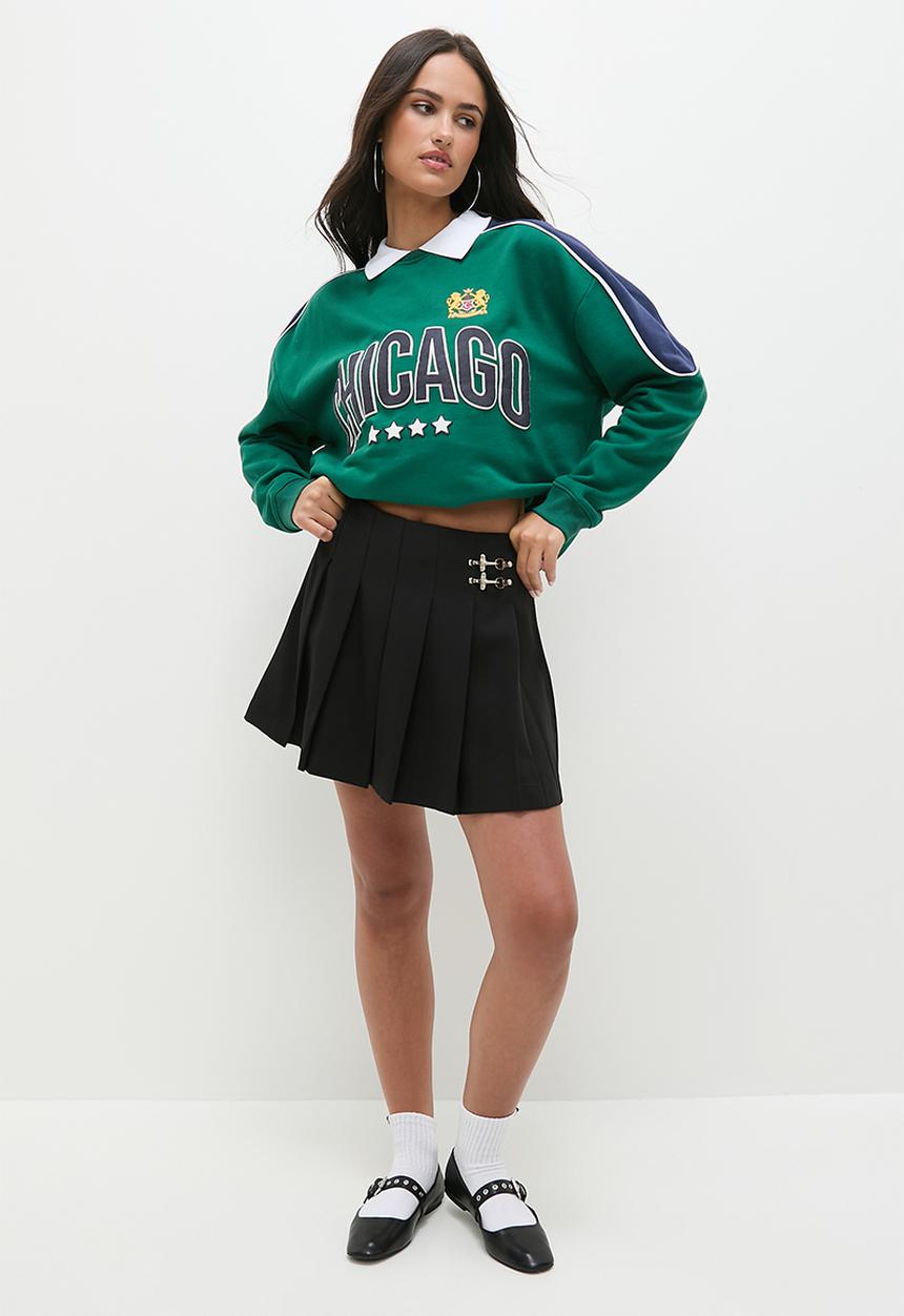 Blake - Pleated mini skirt with buckle - black