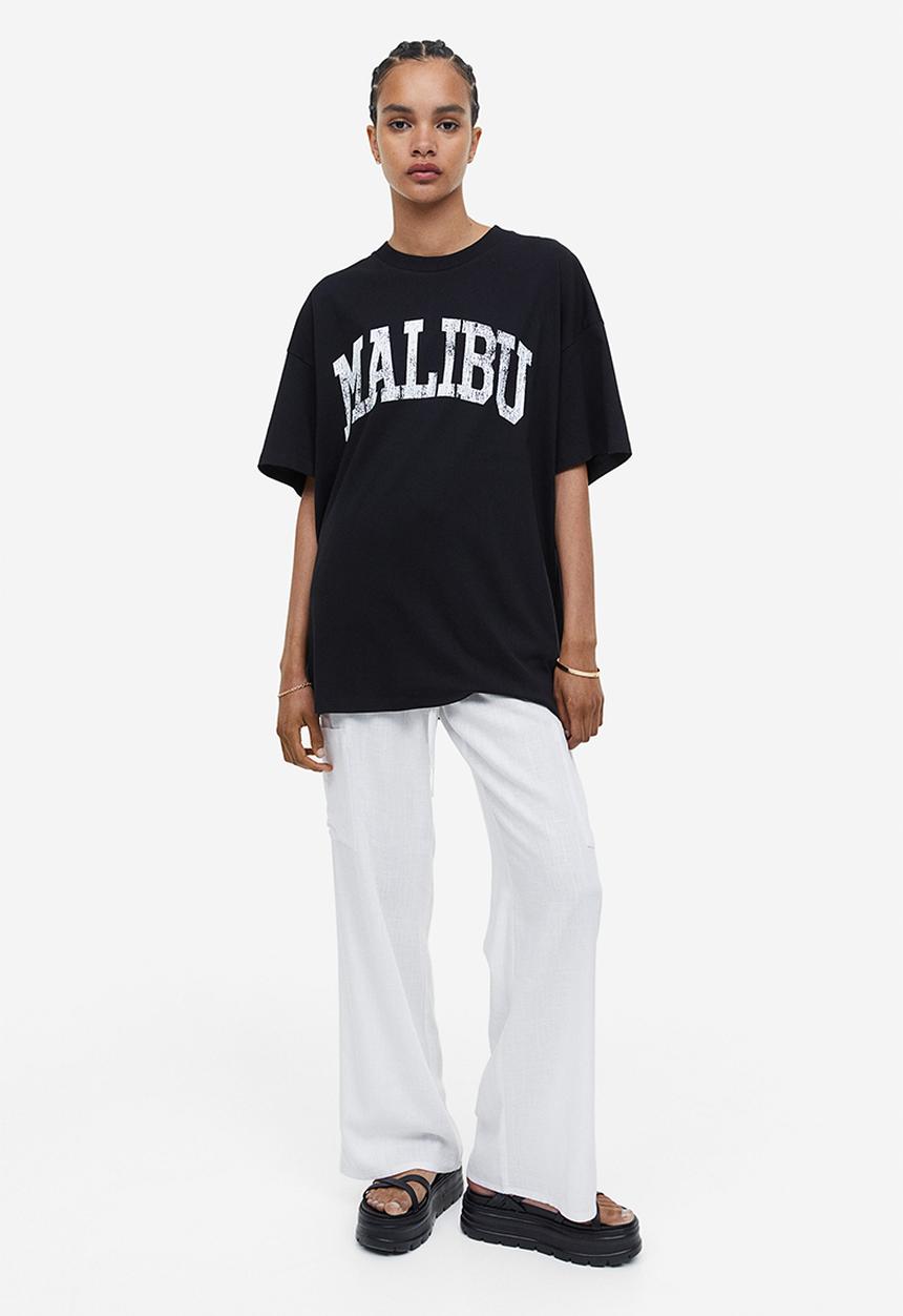 H&M - Oversized printed T-shirt - black malibu 