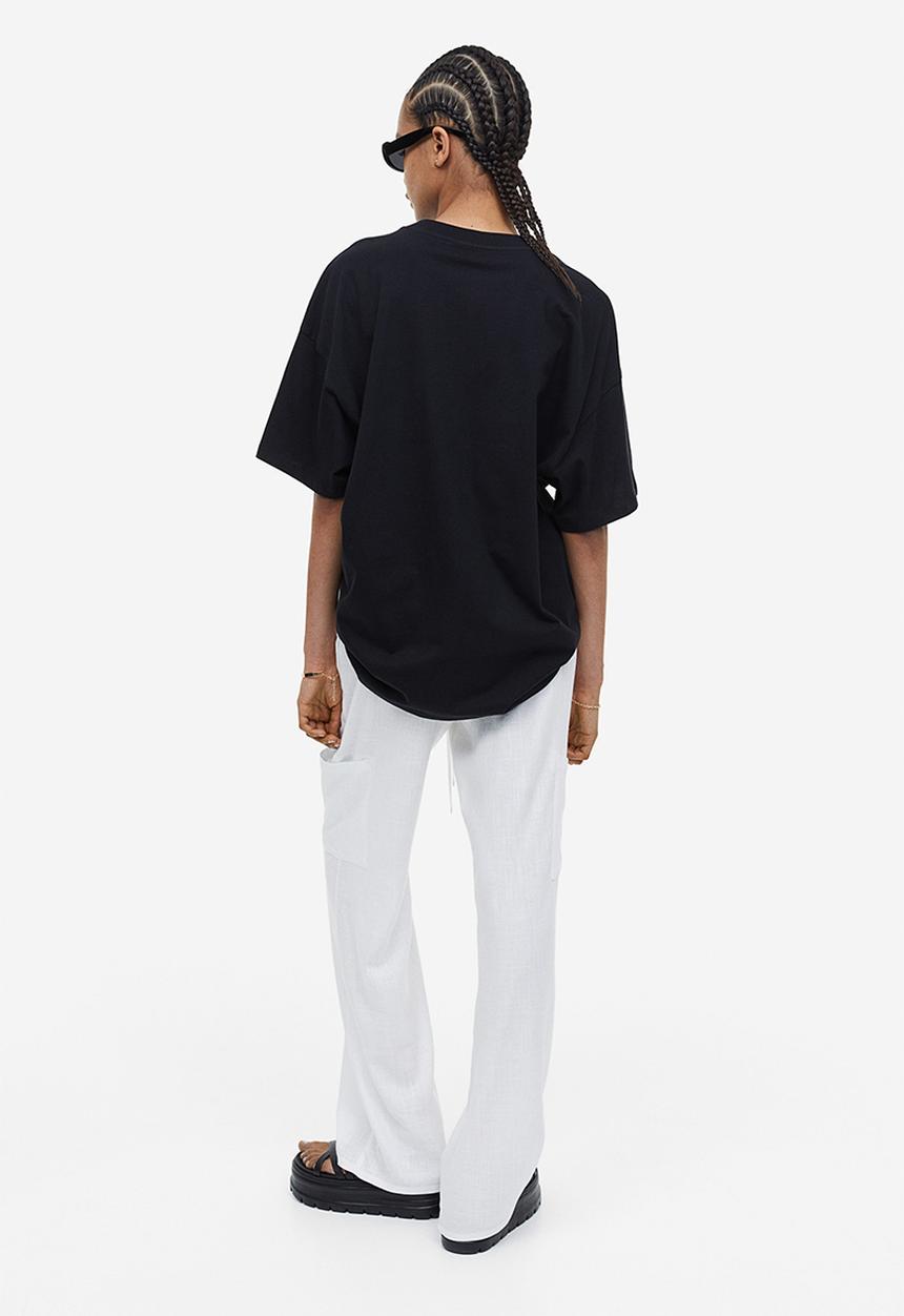 H&M - Oversized printed T-shirt - black malibu 