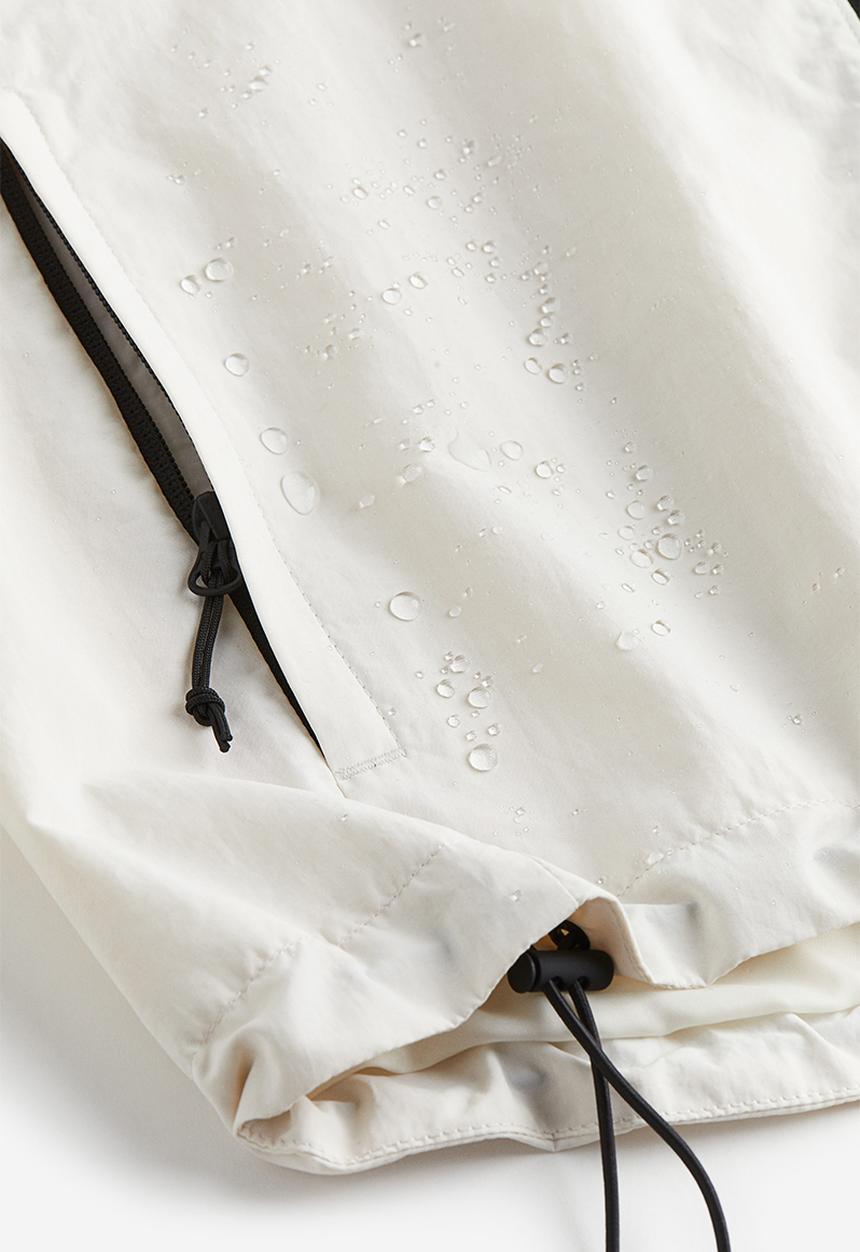 H&M - Regular fit windbreaker - beige/white