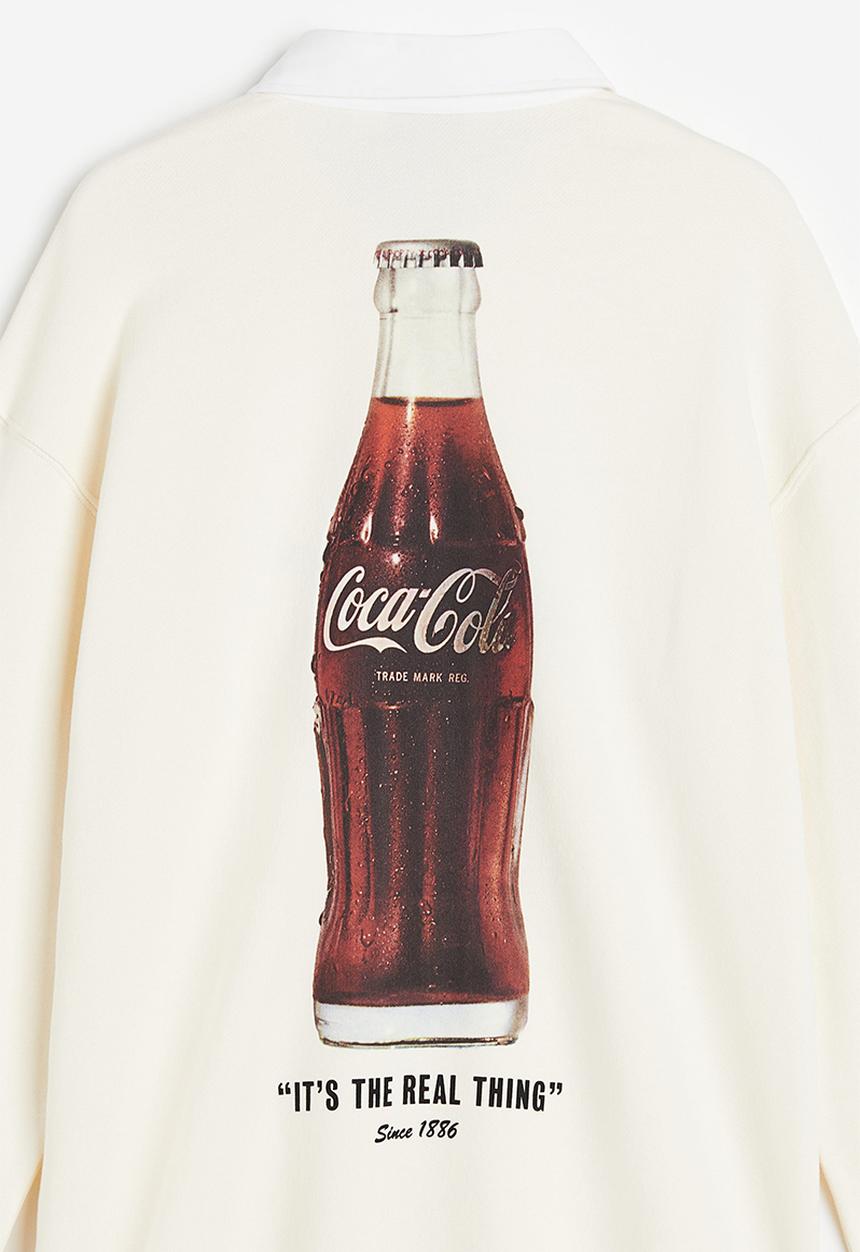 H&M - Relaxed fit printed polo shirt - Cream Coca-Cola
