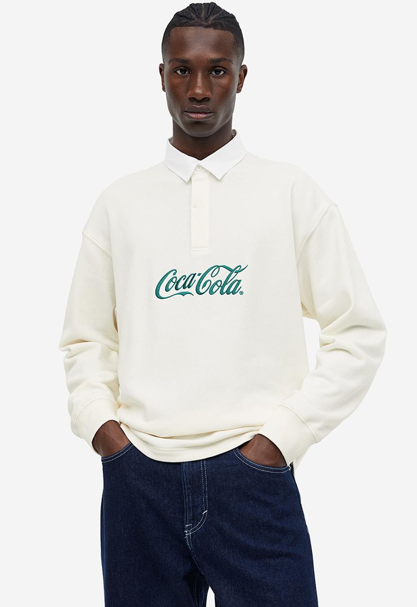 H&M - Relaxed fit printed polo shirt - Cream Coca-Cola