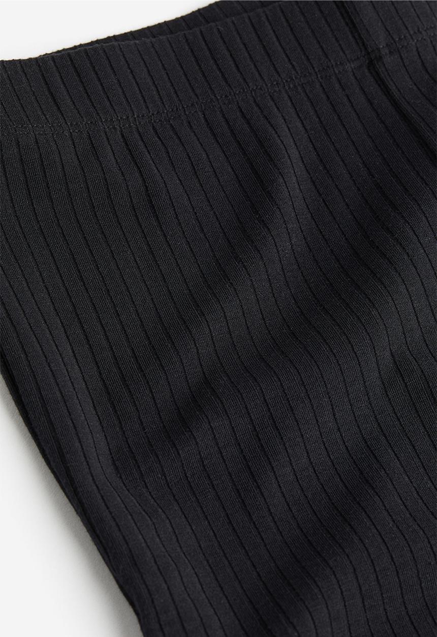 H&M - Flared trousers - black