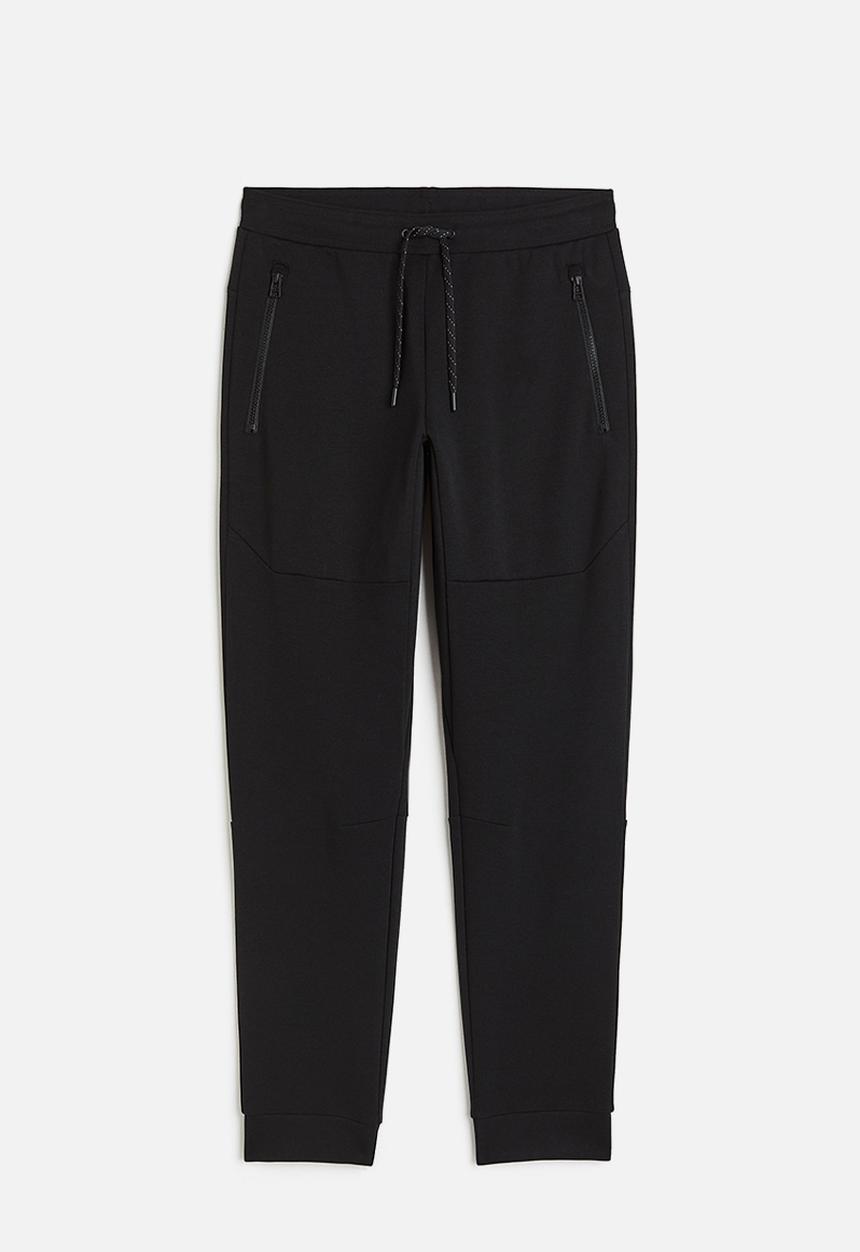 H&M - Drymove™ tapered tech joggers with zipped pockets - black
