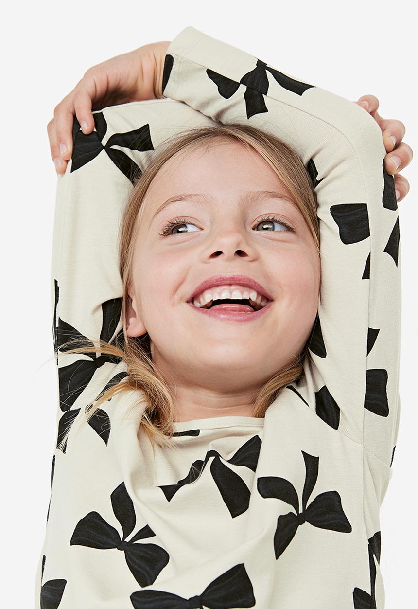 H&M - Printed jersey top - white bows