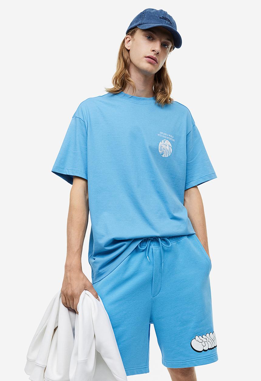 H&M - Relaxed fit printed sweatshorts - light blue/strada