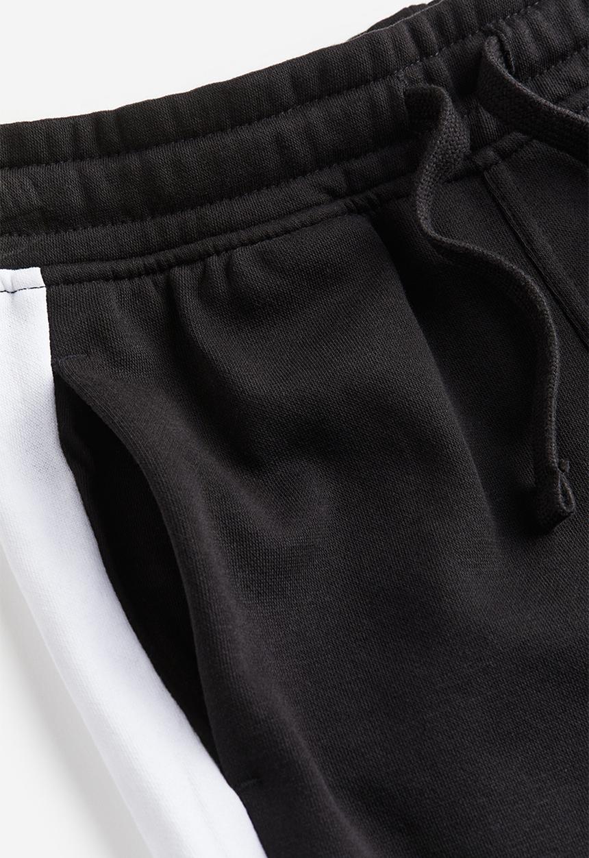 H&M - Sweatpants - black/block-coloured