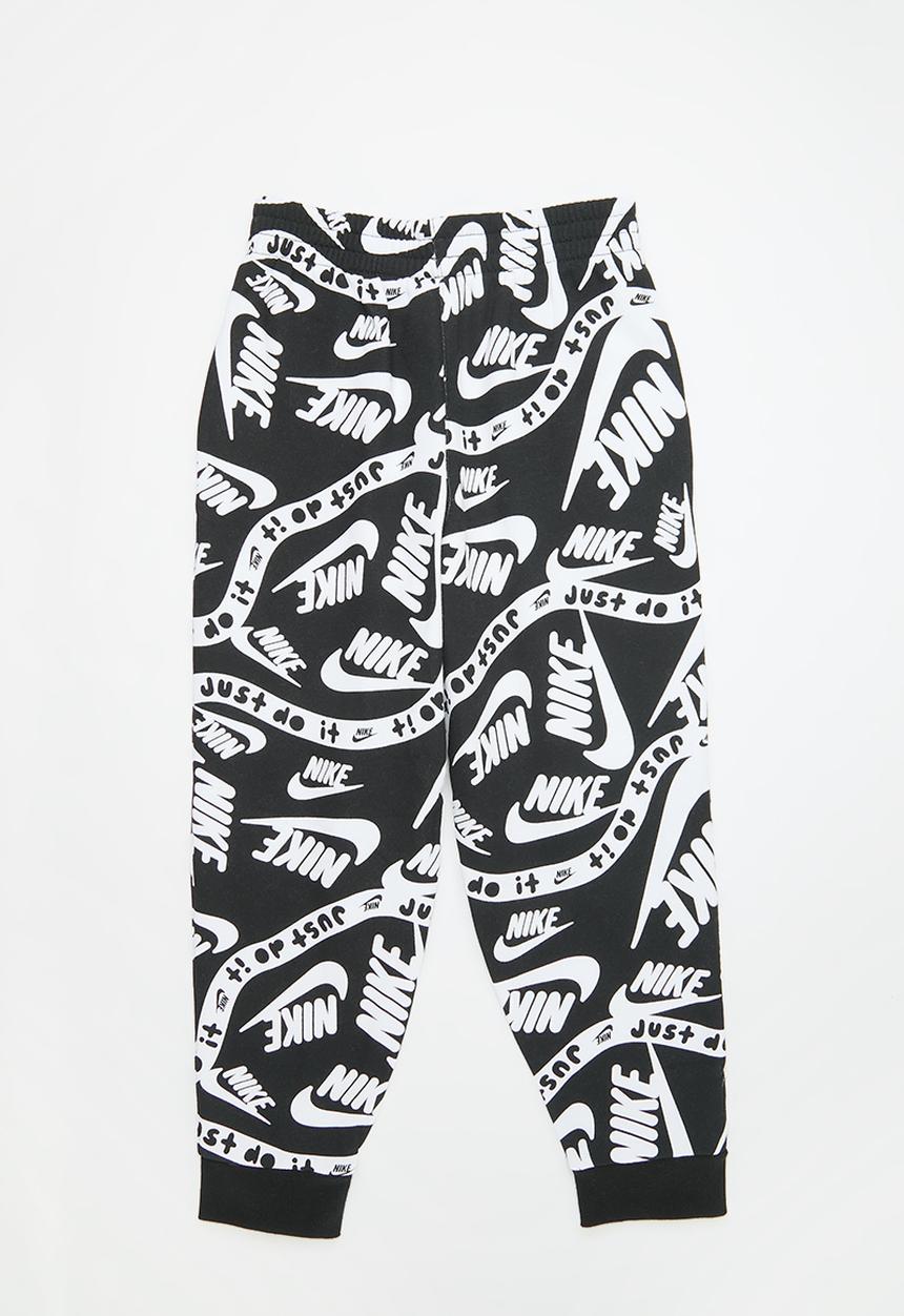 Nike - Nike all-over print joggers - black