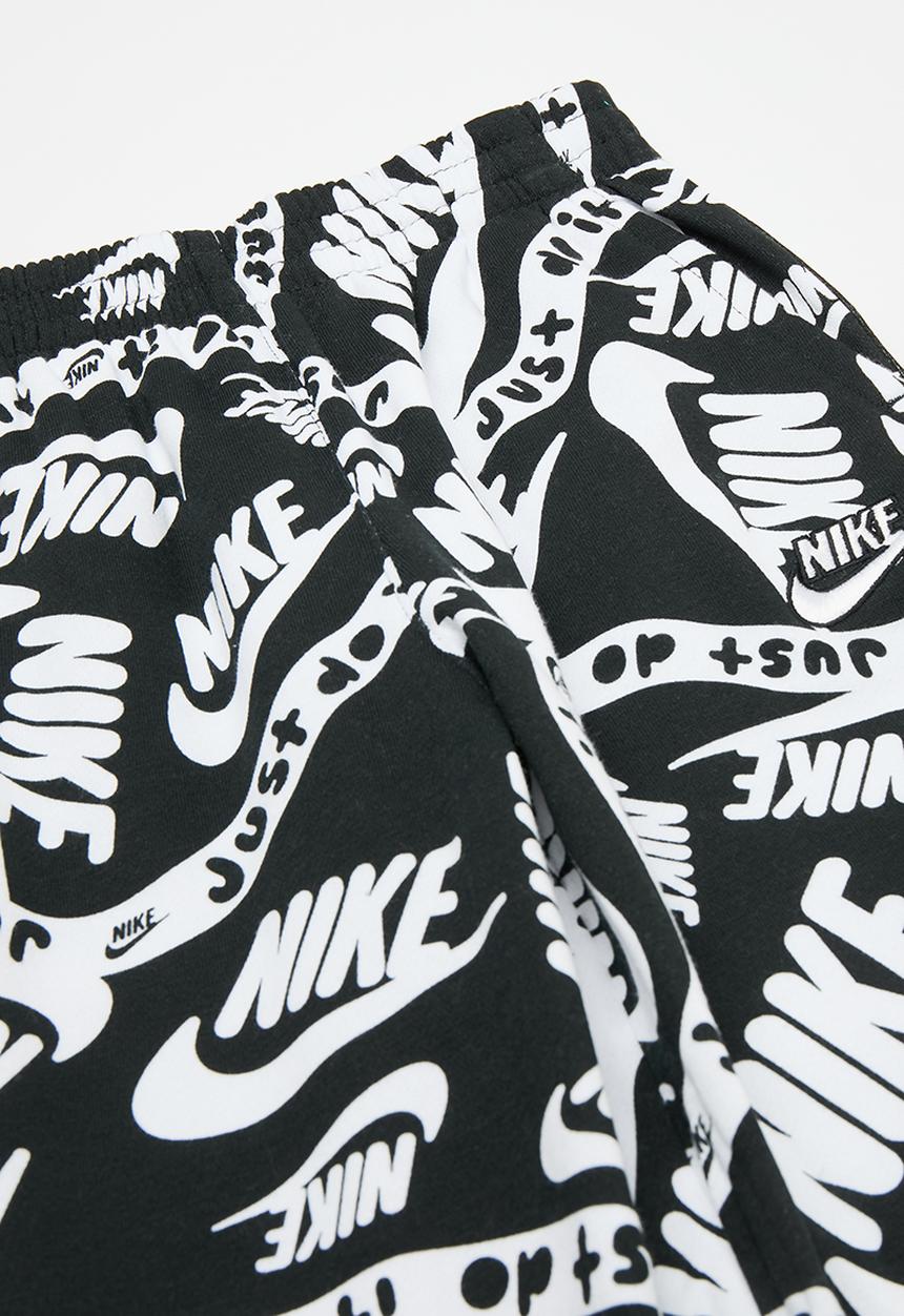 Nike - Nike all-over print joggers - black
