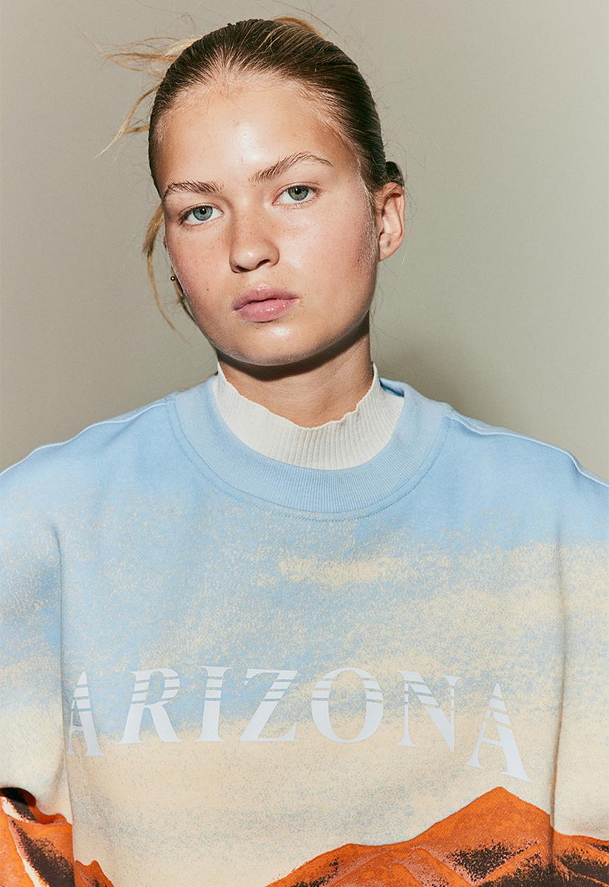 H&M - Oversized printed sweatshirt - light blue/arizona
