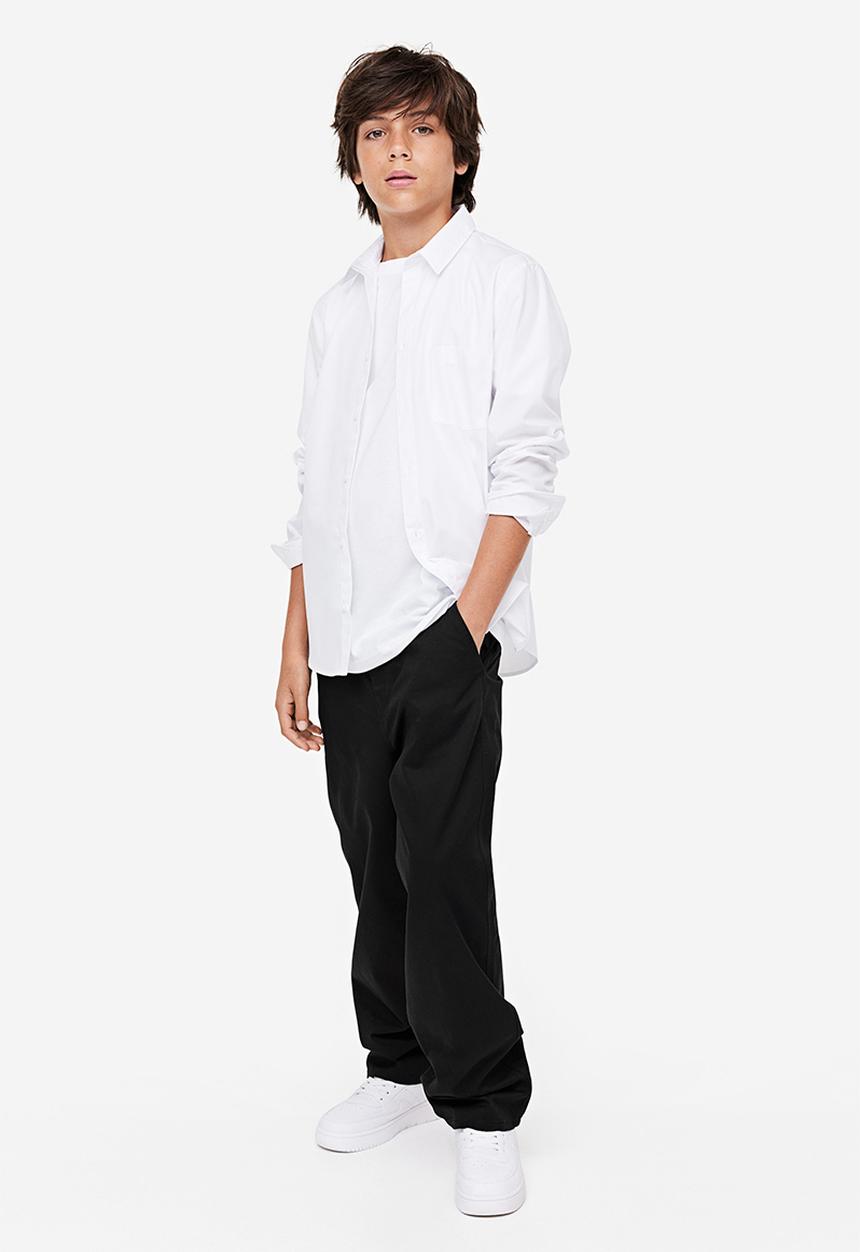 H&M - Relaxed fit chinos - black