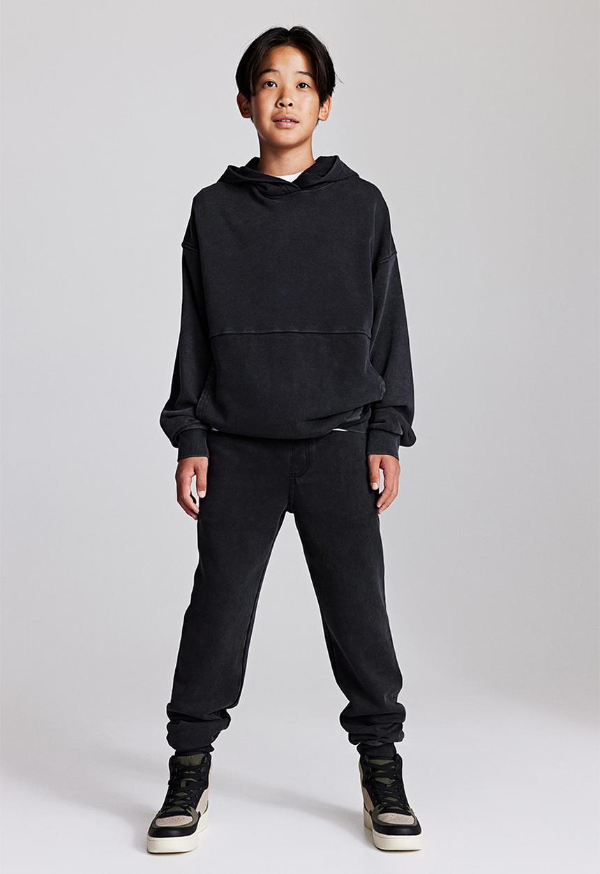 H&M - Printed joggers - black/washed out