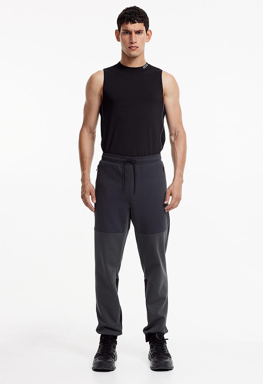 H&M - Drymove™ tapered tech joggers with zipped pockets - black