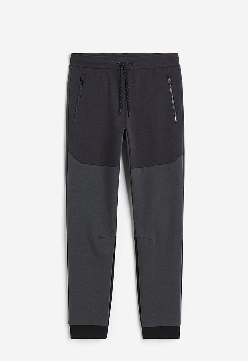 H&M - Drymove™ tapered tech joggers with zipped pockets - black