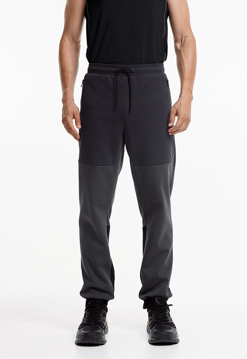 H&M - Drymove™ tapered tech joggers with zipped pockets - black