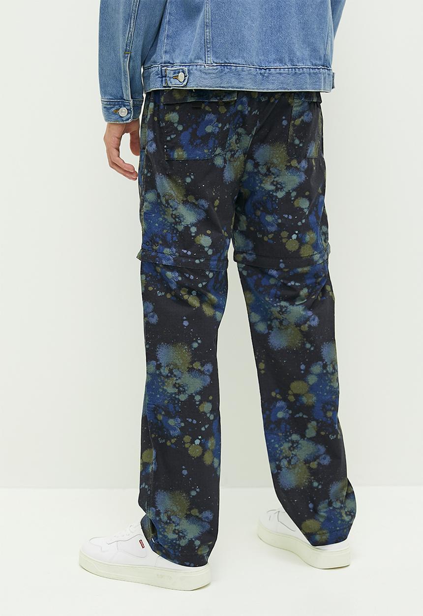 Utility zip-off pant splatter paint mete