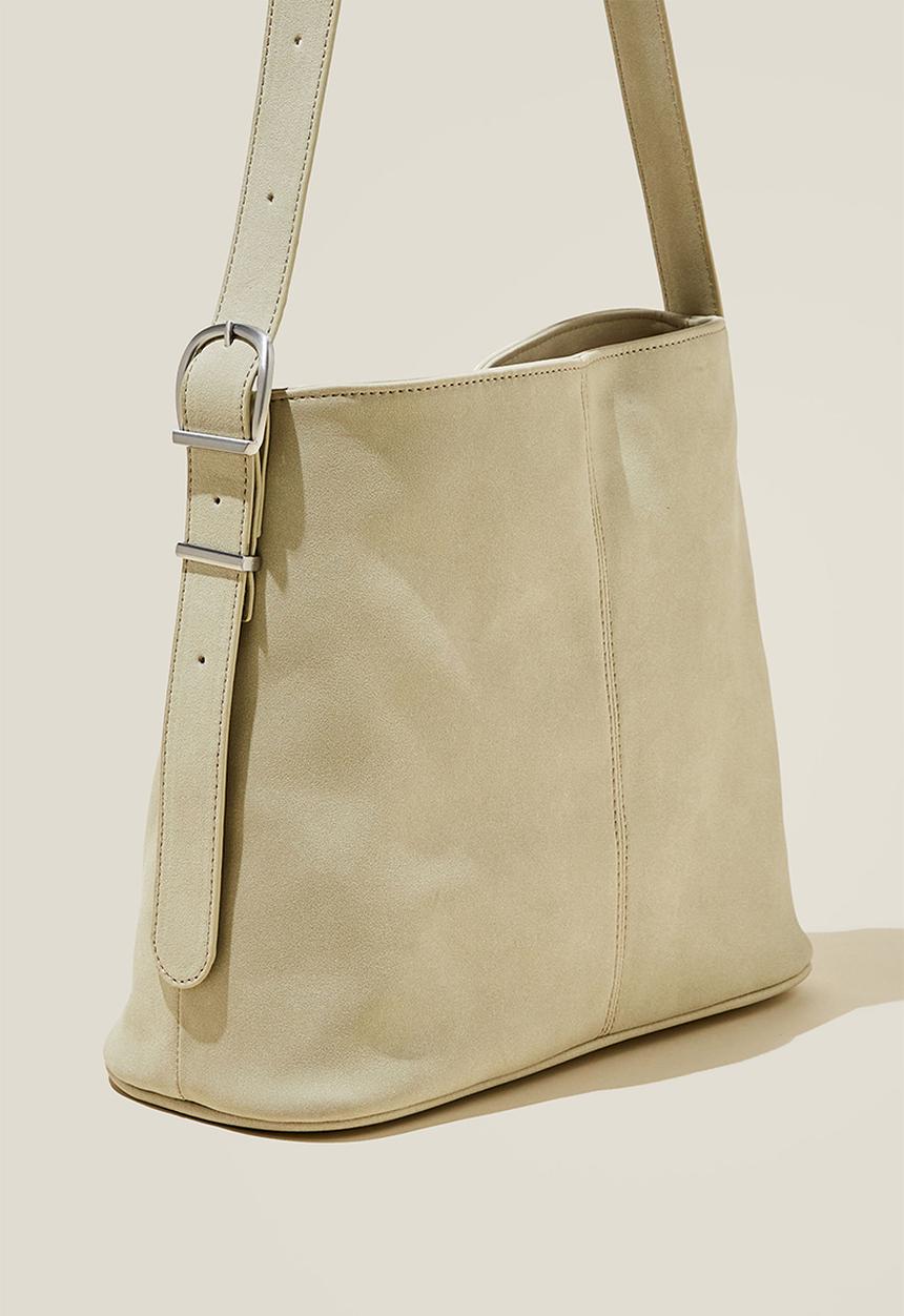 Rubi - Bentley bucket cross body bag- light stone faux suede