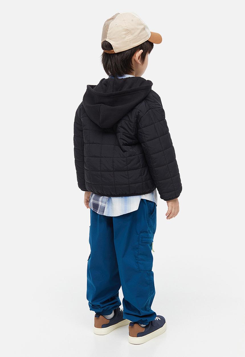 H&M - Quilted jacket with a hood - black
