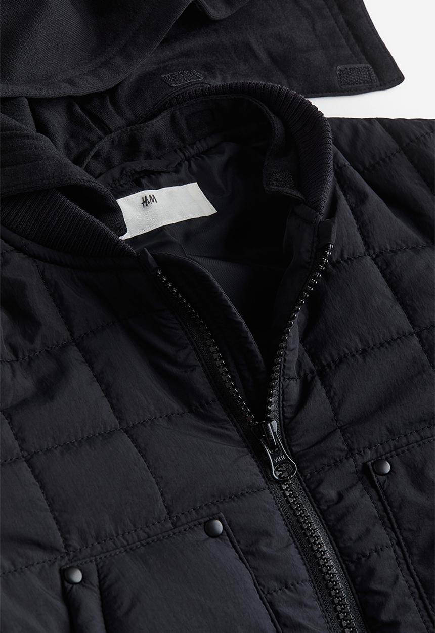 H&M - Quilted jacket with a hood - black