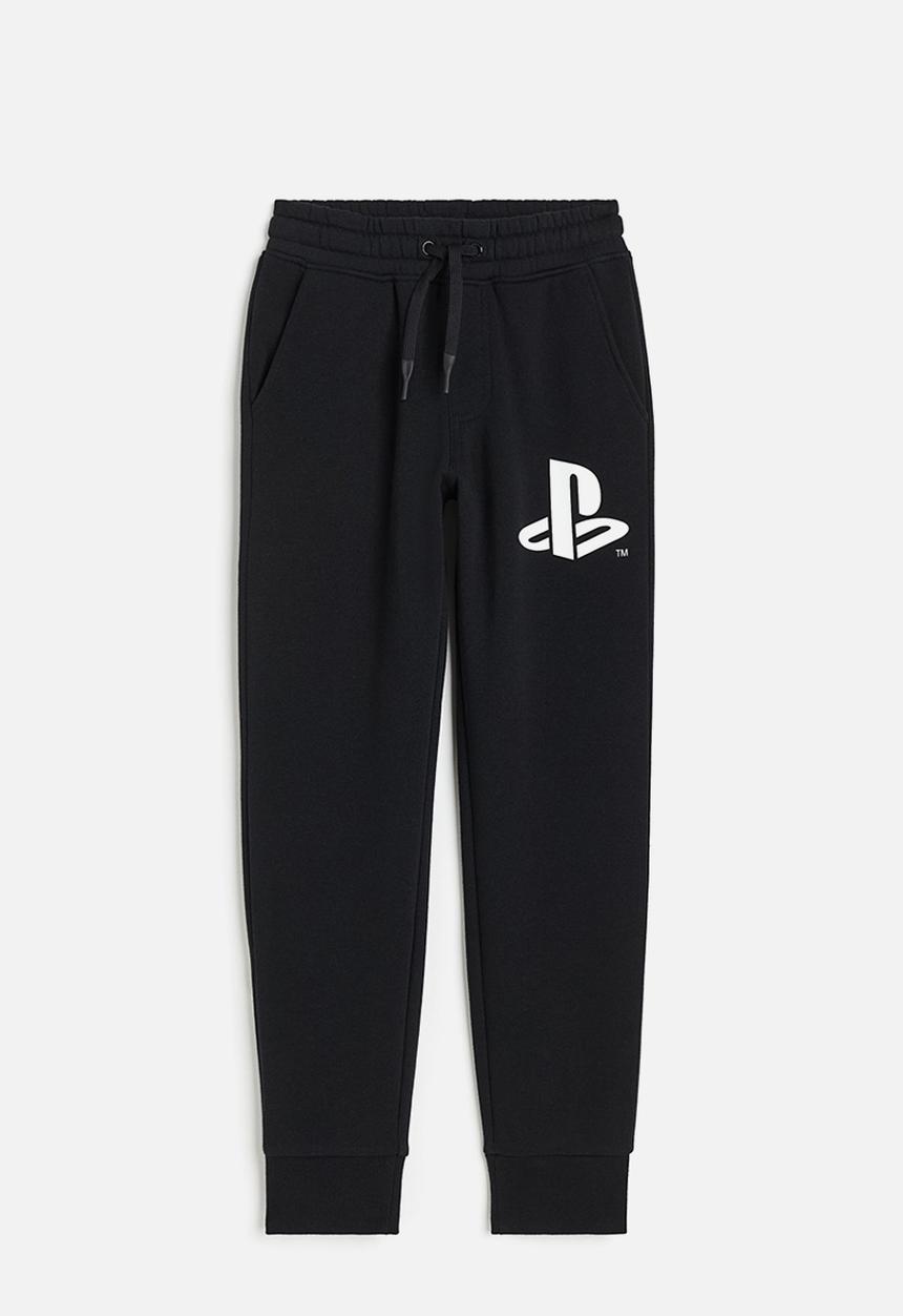H&M - Printed joggers - black playstation