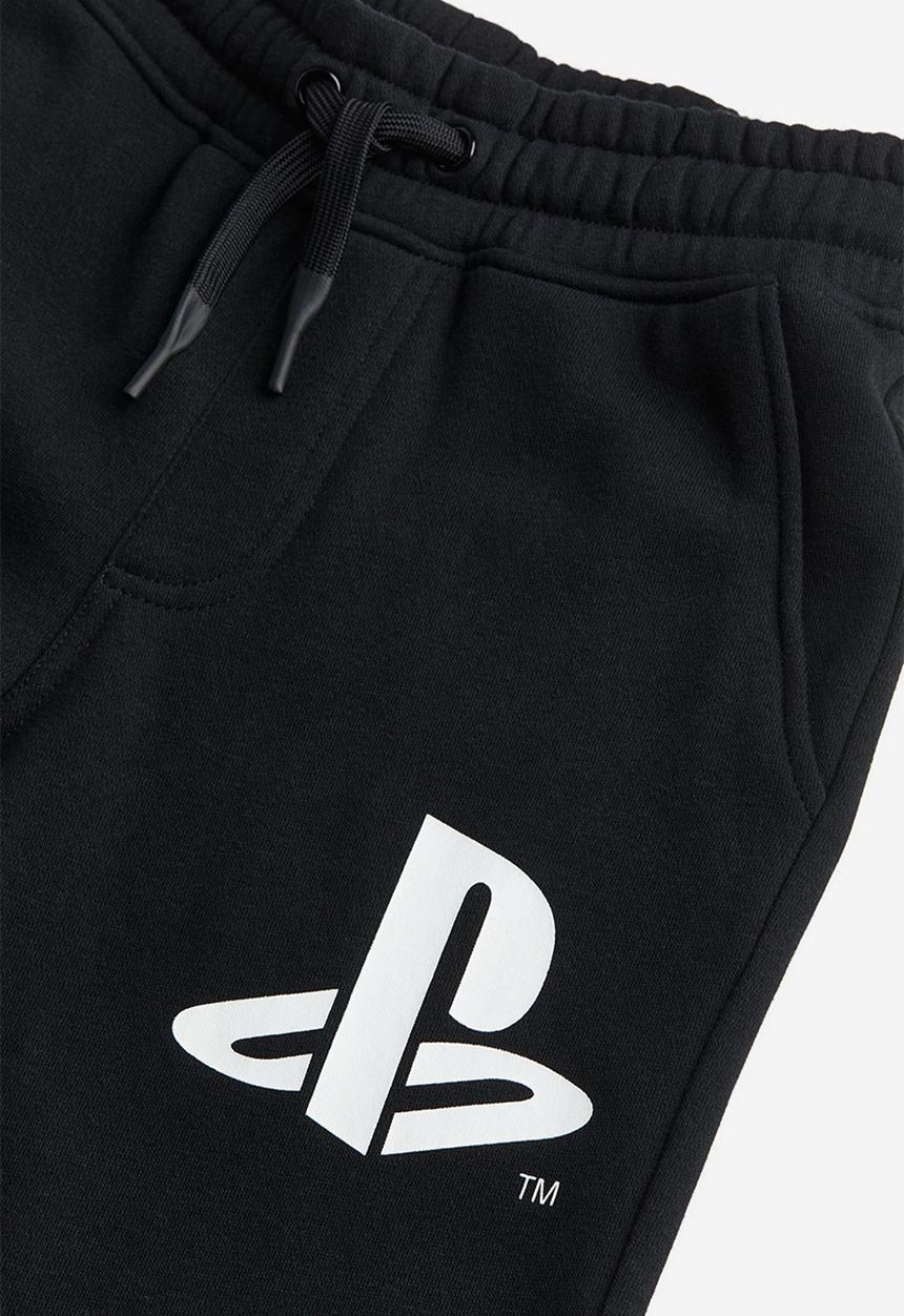 H&M - Printed joggers - black playstation