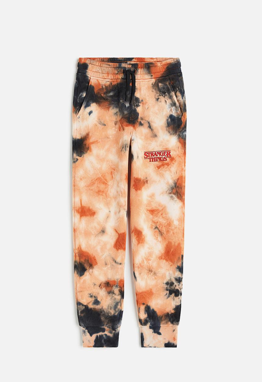 H&M - Printed joggers - orange & tie-dye