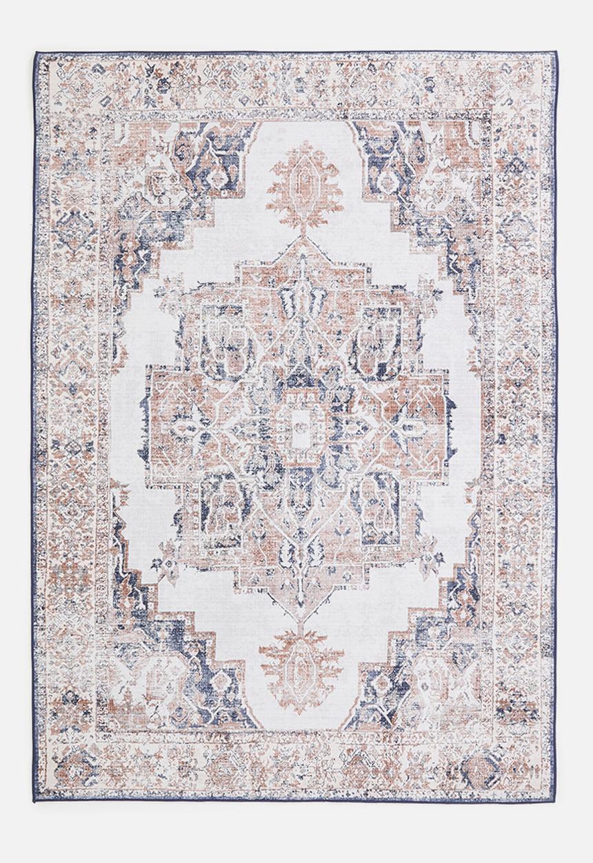 Sixth Floor - Brisbane antique rug - rust & blue