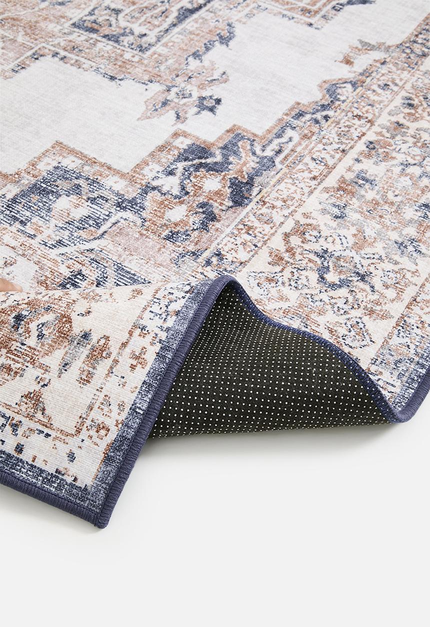 Sixth Floor - Brisbane antique rug - rust & blue