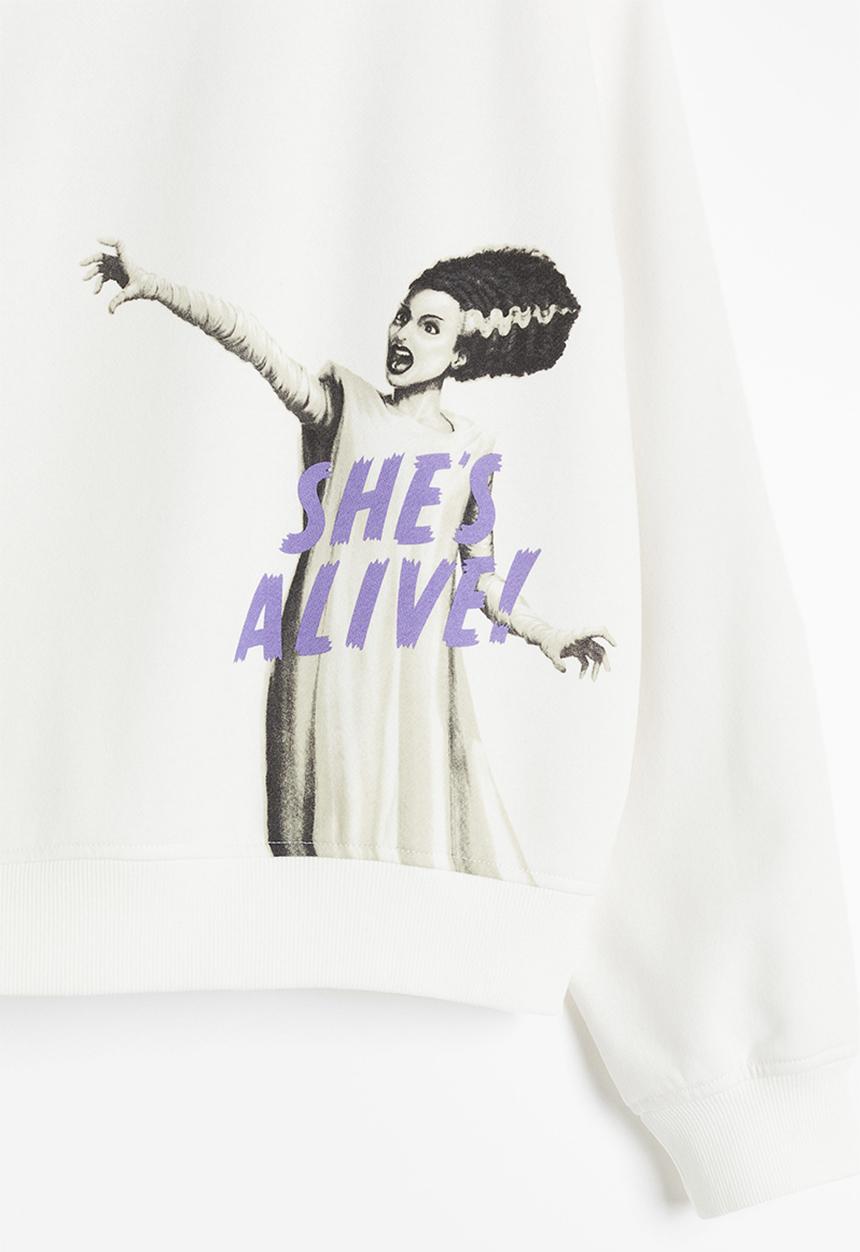 H&M - Printed sweatshirt - cream/universal monsters