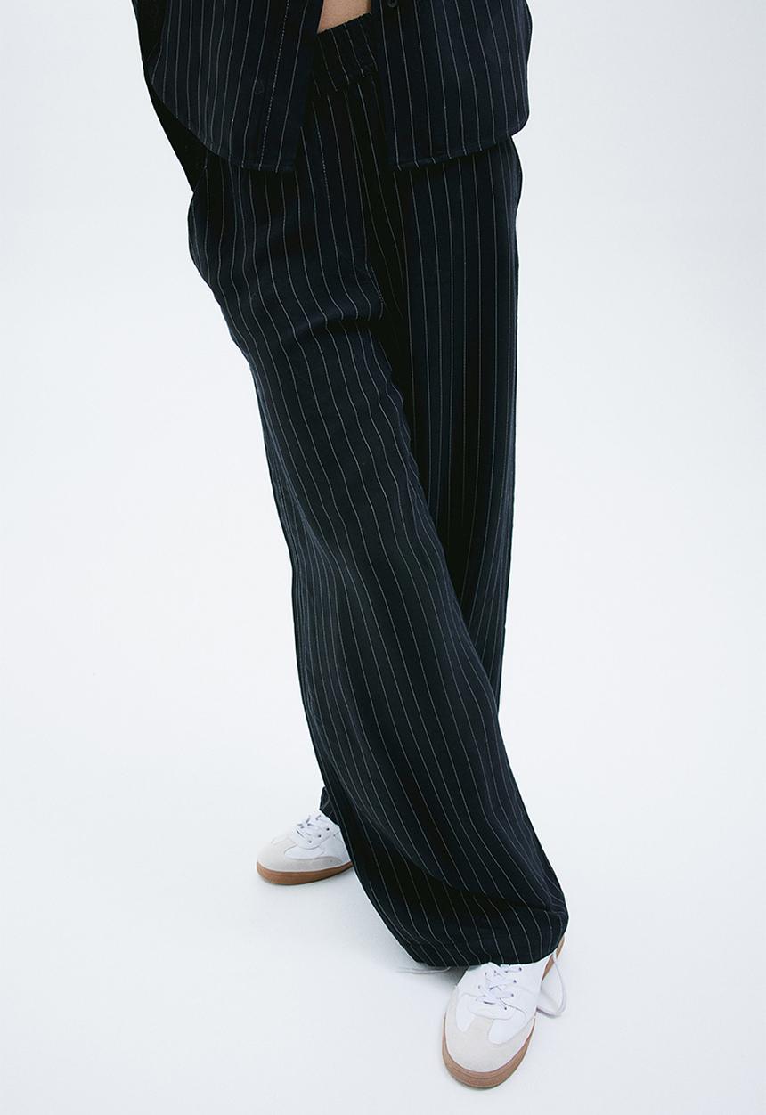 H&M - Pinstriped trousers - black/pinstriped