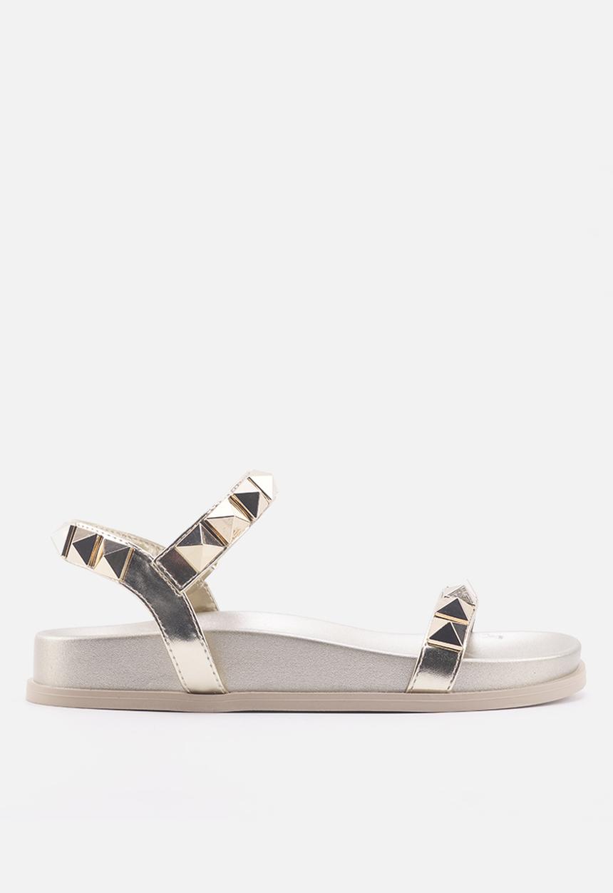 Nine West - Mild ankle strap studded sandal - gold