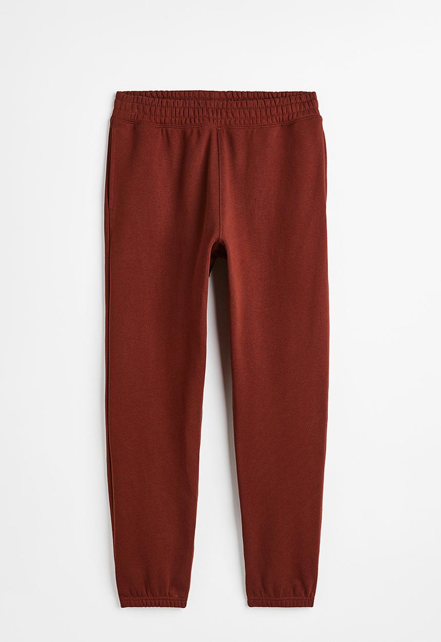 H&M - Relaxed fit cotton joggers - rust red