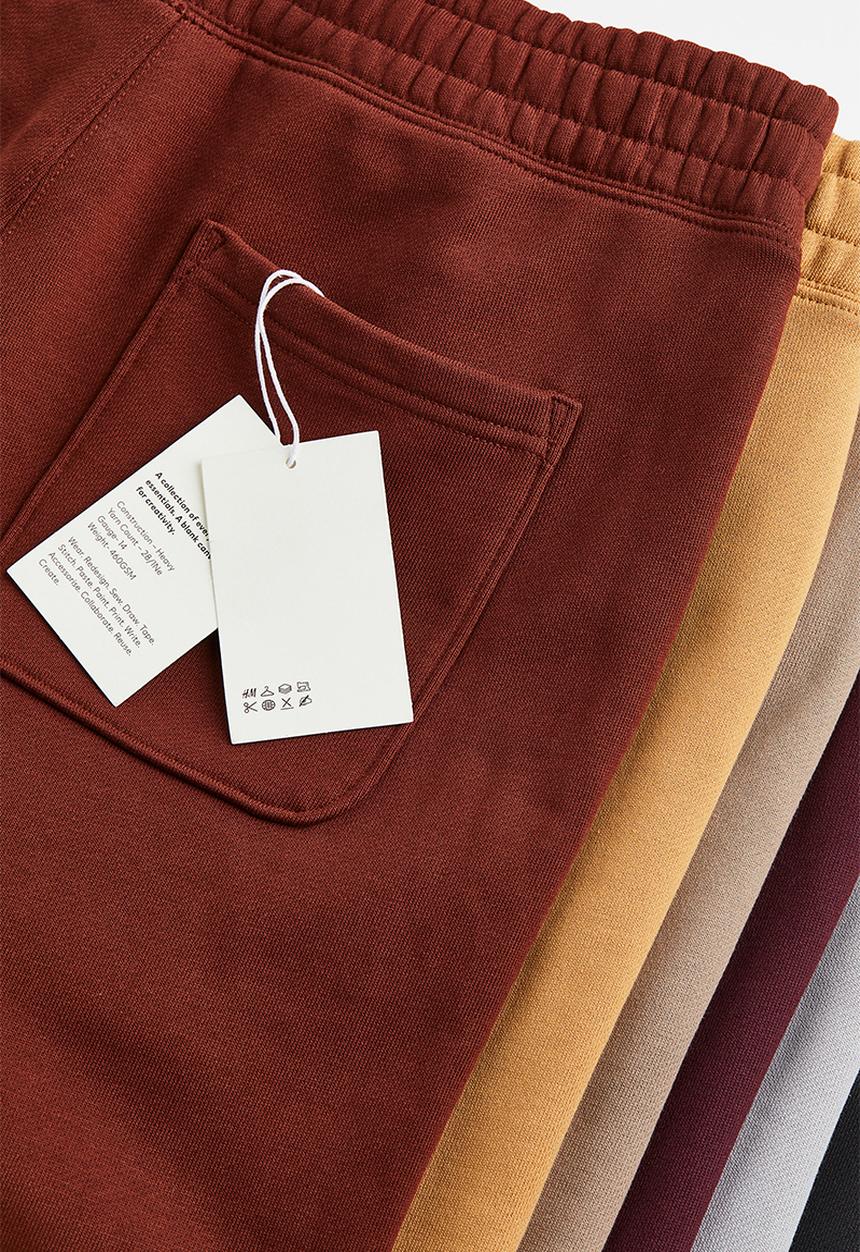 H&M - Relaxed fit cotton joggers - rust red