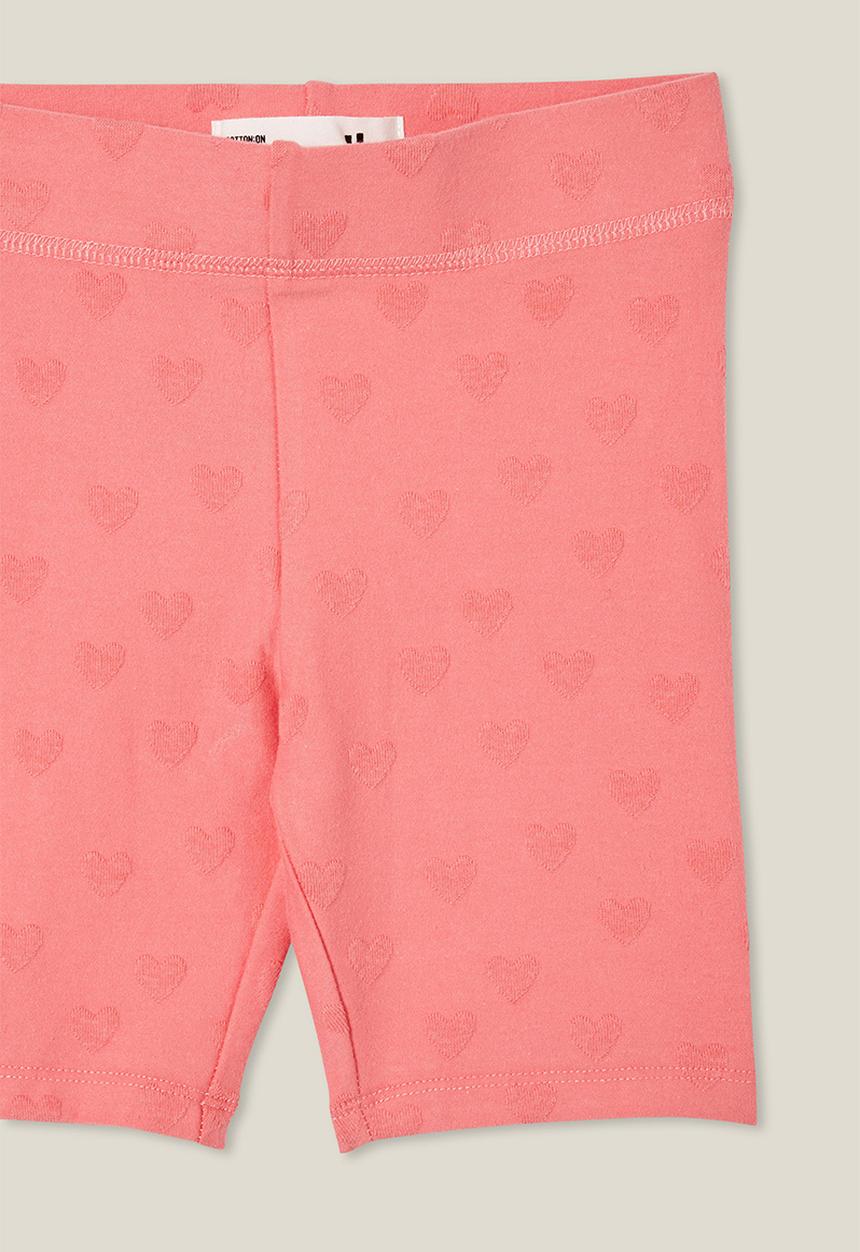 Cotton On - Hailey bike short - orange coral/hearts