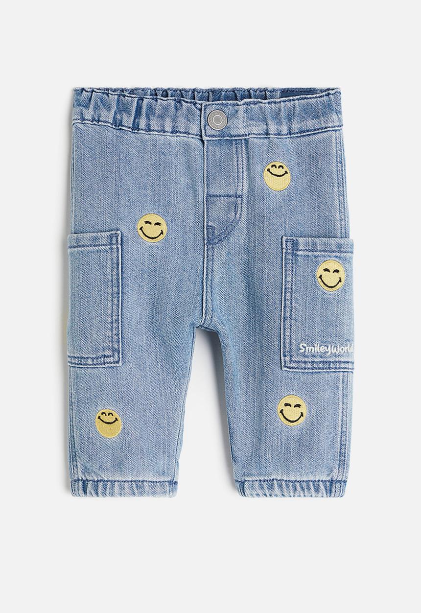H&M - Relaxed fit appliquéd jeans - Light denim blue SmileyWorld®