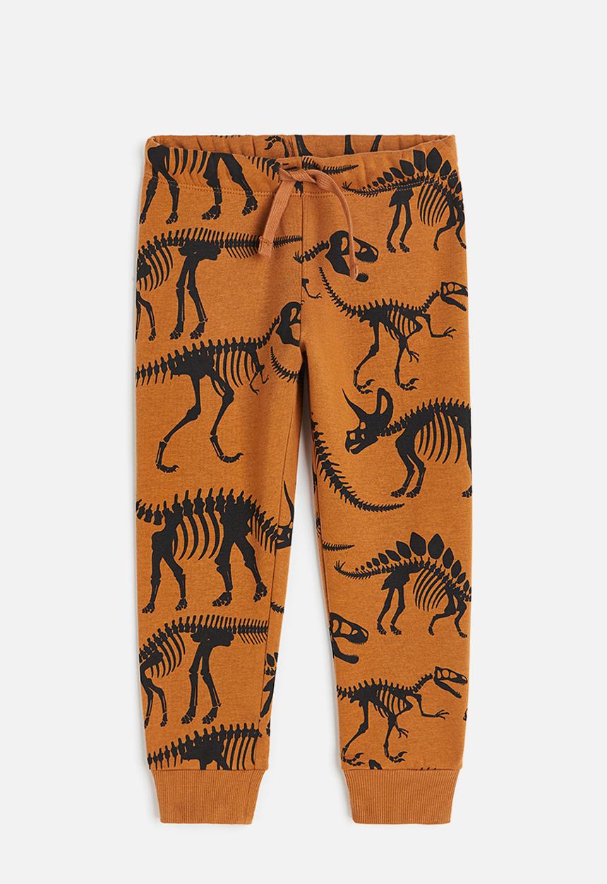 H&M - Printed joggers - brown dinosaurs