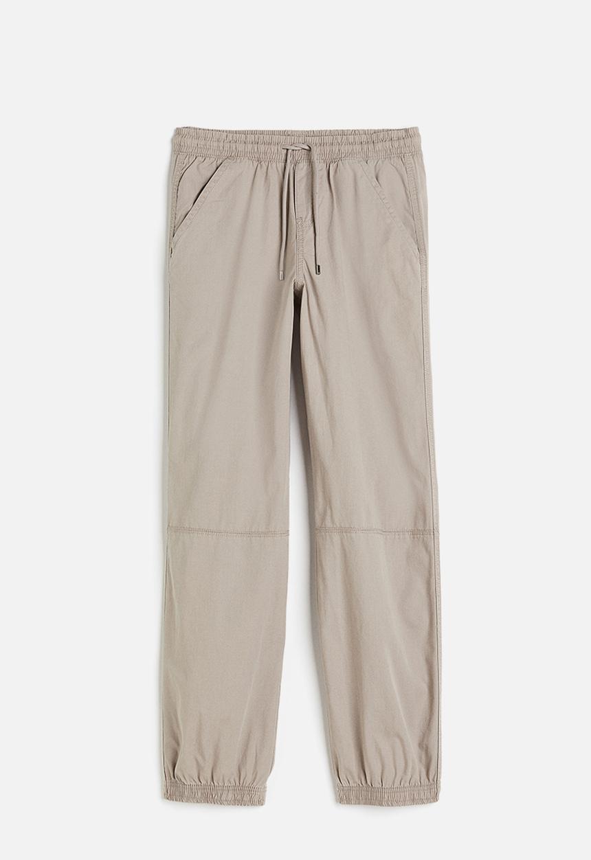 H&M - Low-waisted pull-on trousers - light greige