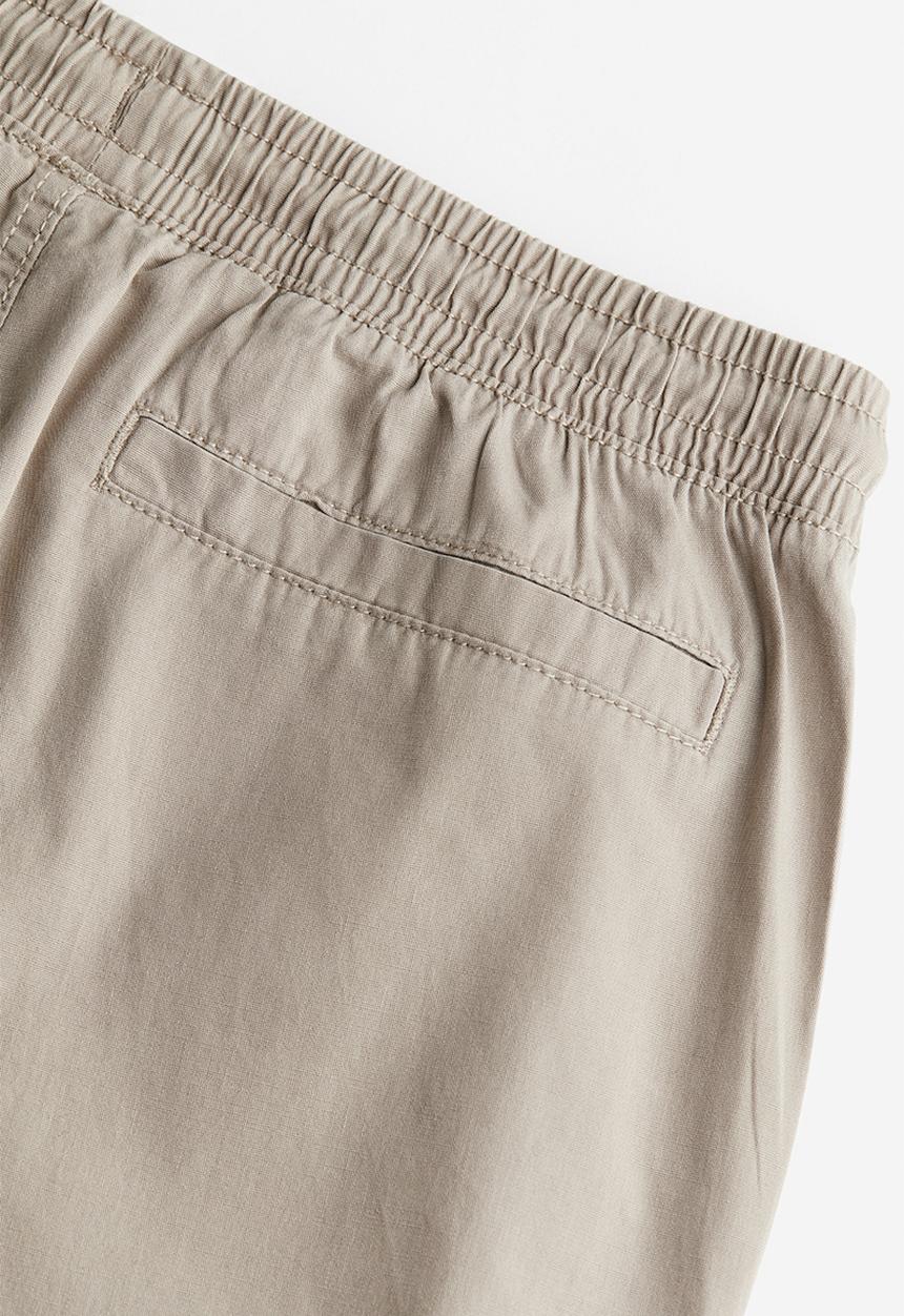 H&M - Low-waisted pull-on trousers - light greige