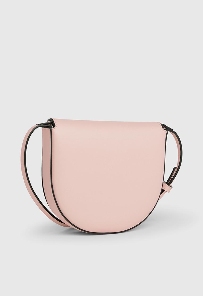 Calvin Klein - Sculpted mini saddle bag - pale conch