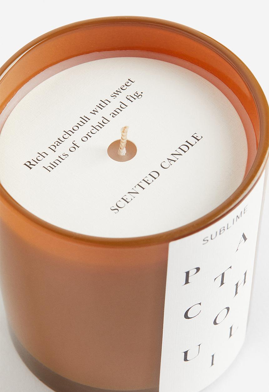 H&M - Scented candle in a glass holder - dark mustard yellow