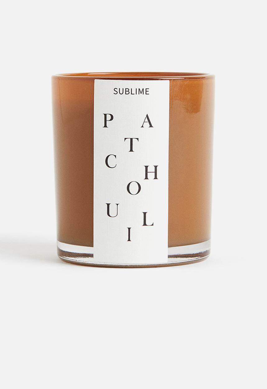 H&M - Scented candle in a glass holder - dark mustard yellow