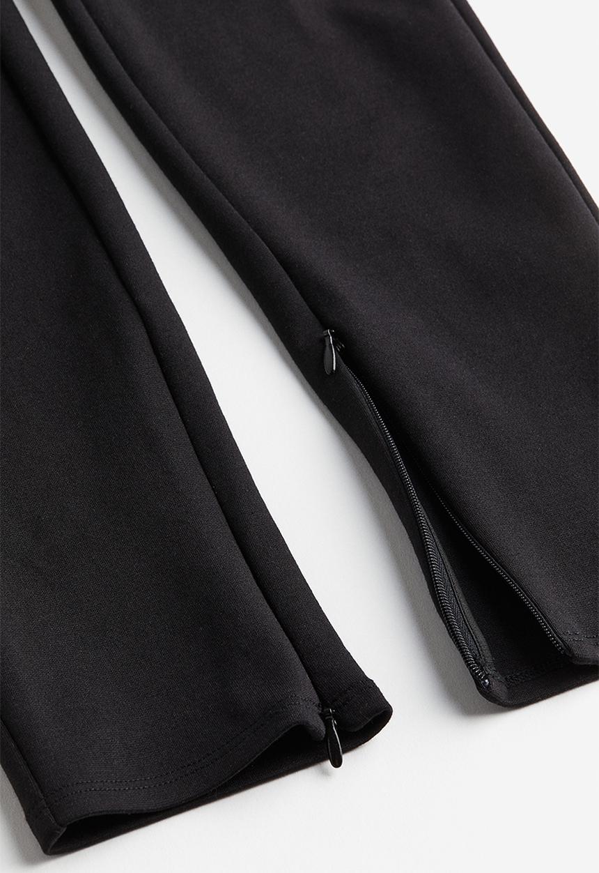 H&M - High-waisted leggings - black