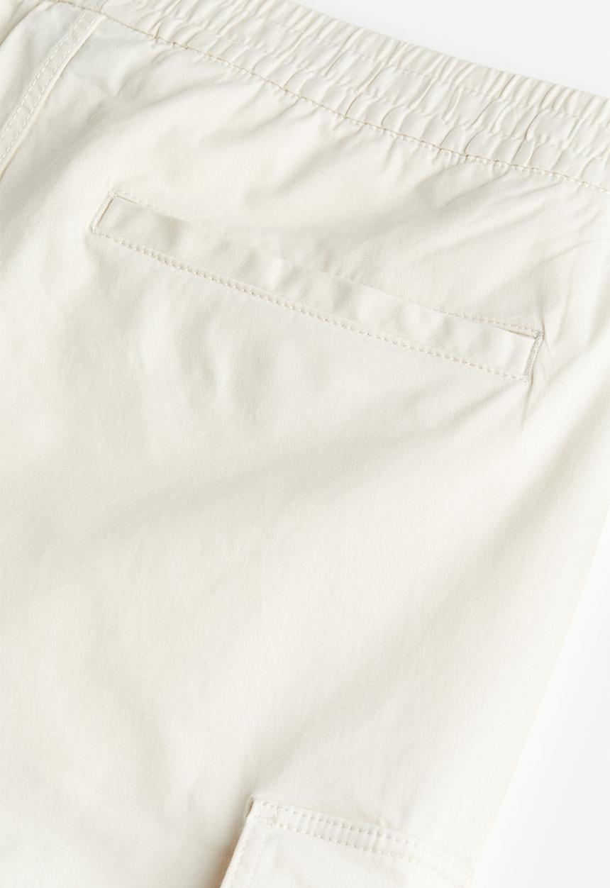 H&M - Relaxed fit cotton cargo joggers - cream 