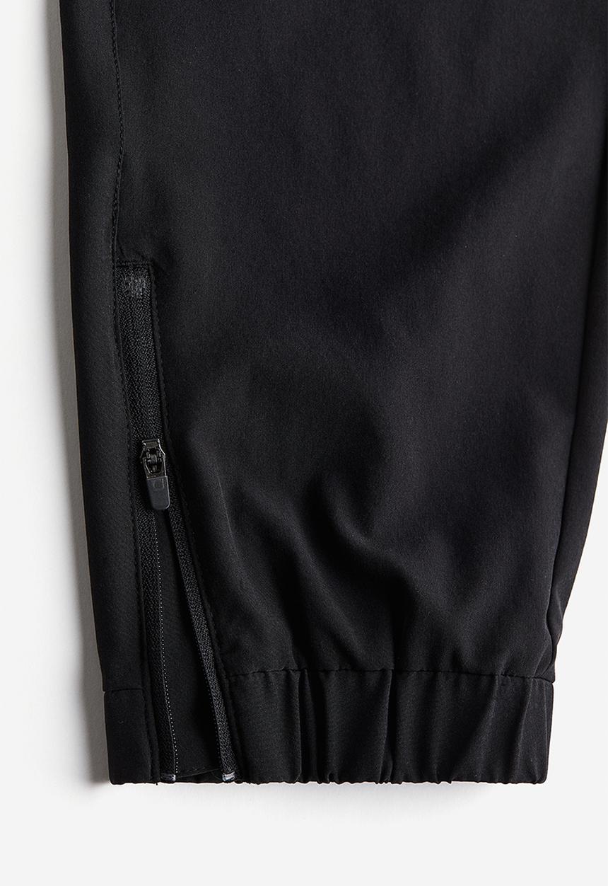 H&M - Drymove™ running trousers - black