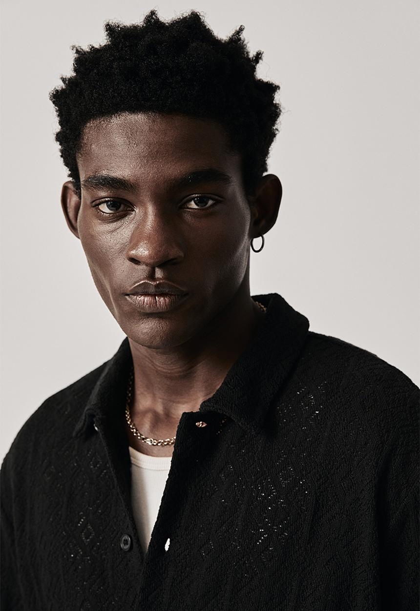 H&M - Regular fit hole-patterned jersey shirt - black