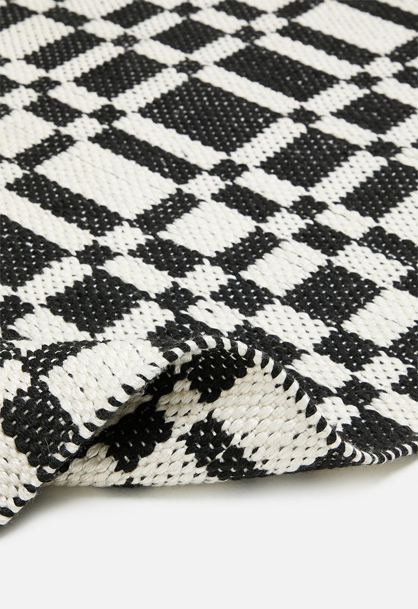 Sixth Floor - Grid outdoor rug - Black