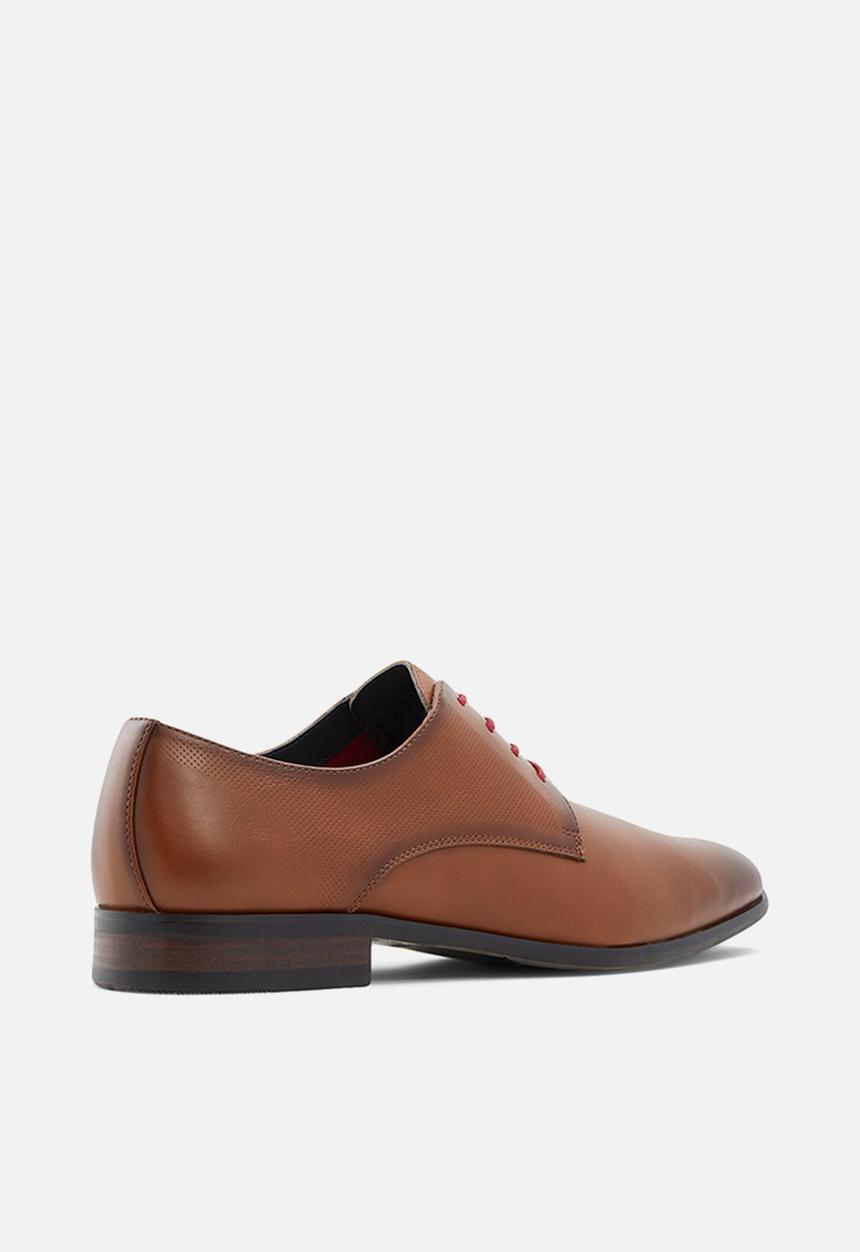 Call It Spring - Hudsen - cognac